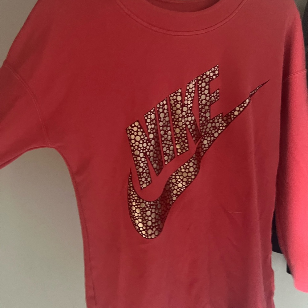 Womens Nike Pink sweatshirt with gold foil swoosh
